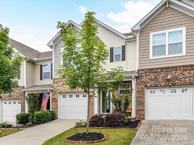 7325 Overmountain Dr, Rock Hill, SC 29732 - view of front of house featuring concrete driveway, brick siding, and an attached garage