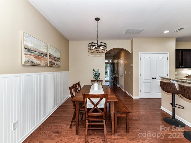 7325 Overmountain Dr, Rock Hill, SC 29732 - dining room featuring arched walkways, dark wood-type flooring, a chandelier, and recessed lighting