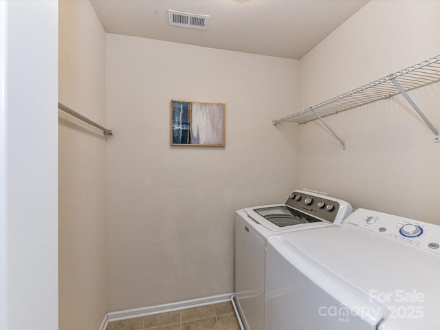 7325 Overmountain Dr, Rock Hill, SC 29732 - laundry area featuring washer and dryer and baseboards