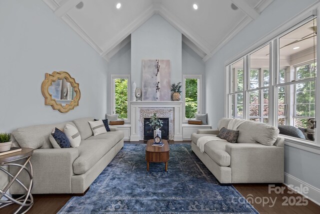 238 Horton Grove Rd, Fort Mill, SC 29715 - living room with wood finished floors, high vaulted ceiling, baseboards, a tiled fireplace, and recessed lighting