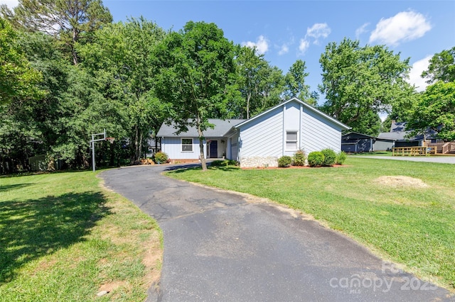2011 20th Street Pl NE, Hickory, NC 28601 - view of front of house with a front lawn and board and batten siding