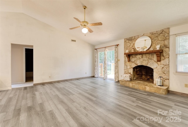 2011 20th Street Pl NE, Hickory, NC 28601 - unfurnished living room featuring lofted ceiling, ceiling fan, wood finished floors, and healthy amount of natural light