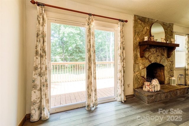 2011 20th Street Pl NE, Hickory, NC 28601 - entryway with wood finished floors, baseboards, and a textured ceiling