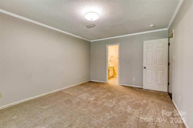 2011 20th Street Pl NE, Hickory, NC 28601 - unfurnished bedroom featuring crown molding, light carpet, a textured ceiling, baseboards, and ensuite bath