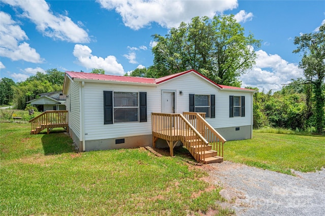 376 Puzzle Creek Rd, Bostic, NC 28018 - view of front of house with crawl space, metal roof, and a front yard
