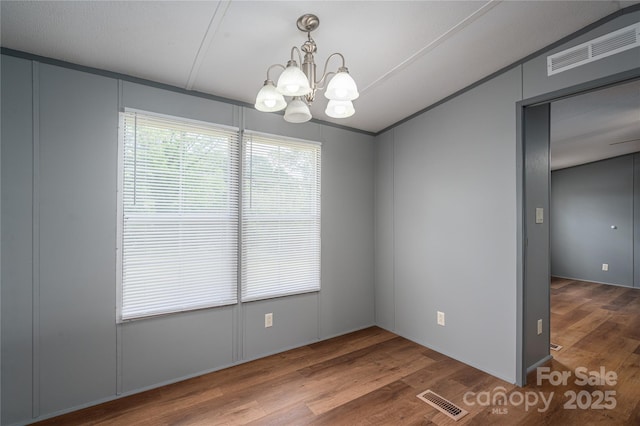 376 Puzzle Creek Rd, Bostic, NC 28018 - spare room with a chandelier and wood finished floors