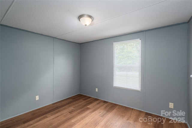 376 Puzzle Creek Rd, Bostic, NC 28018 - unfurnished room featuring wood finished floors