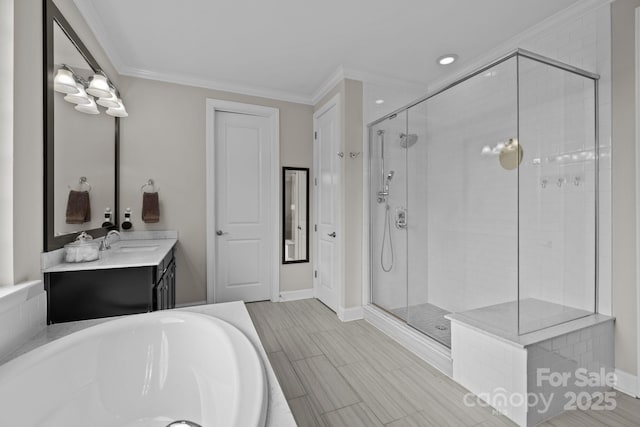 2414 Madeira Cir, Waxhaw, NC 28173 - bathroom featuring a garden tub, a shower stall, ornamental molding, vanity, and recessed lighting