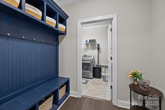 2414 Madeira Cir, Waxhaw, NC 28173 - mudroom featuring washer / clothes dryer, ornamental molding, dark wood-style floors, and baseboards