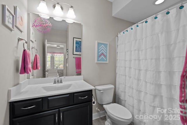 2414 Madeira Cir, Waxhaw, NC 28173 - bathroom with toilet, vanity, and a shower with curtain