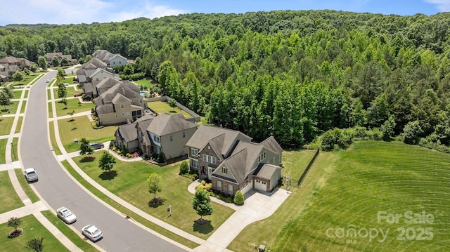 2414 Madeira Cir, Waxhaw, NC 28173 - aerial view of residential area featuring a heavily wooded area