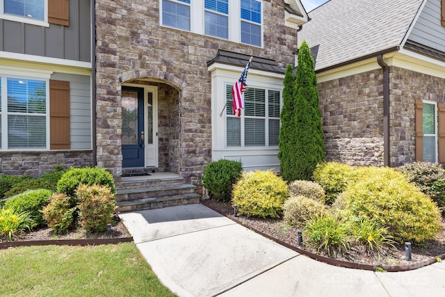 2414 Madeira Cir, Waxhaw, NC 28173 - property entrance featuring stone siding and board and batten siding