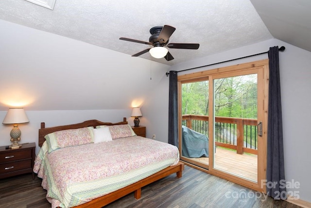 406 Poker Branch Rd, Sylva, NC 28779 - bedroom with vaulted ceiling, dark wood-style floors, access to exterior, a textured ceiling, and a ceiling fan