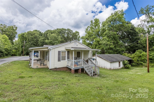 102 Lanier St, Mount Holly, NC 28120 - view of front of home featuring a front yard and covered porch
