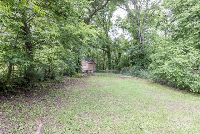 102 Lanier St, Mount Holly, NC 28120 - view of yard featuring a wooded view