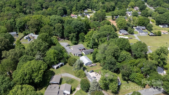 102 Lanier St, Mount Holly, NC 28120 - aerial overview of property's location with nearby suburban area and a forest