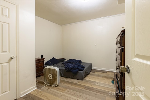 102 Lanier St, Mount Holly, NC 28120 - bedroom featuring wood finished floors and baseboards