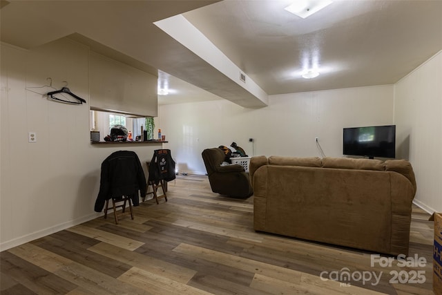102 Lanier St, Mount Holly, NC 28120 - living area featuring wood finished floors and baseboards