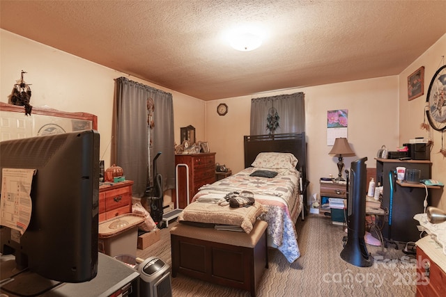 102 Lanier St, Mount Holly, NC 28120 - carpeted bedroom with a textured ceiling