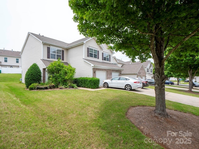 12222 Stratfield Place Cir, Pineville, NC 28134 - view of front of home with a garage, concrete driveway, and a front yard