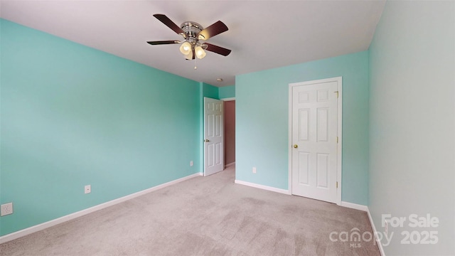 12222 Stratfield Place Cir, Pineville, NC 28134 - unfurnished bedroom with carpet flooring, baseboards, and ceiling fan