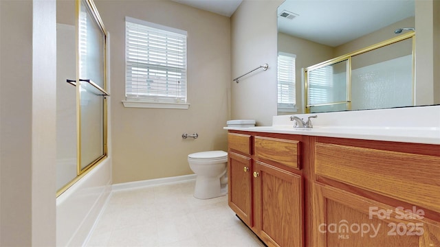 12222 Stratfield Place Cir, Pineville, NC 28134 - bathroom with vanity, toilet, baseboards, and bath / shower combo with glass door