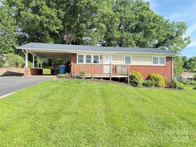1303 Rambling Acres Cir, Lenoir, NC 28645 - view of front of property featuring driveway, a front yard, brick siding, and a carport