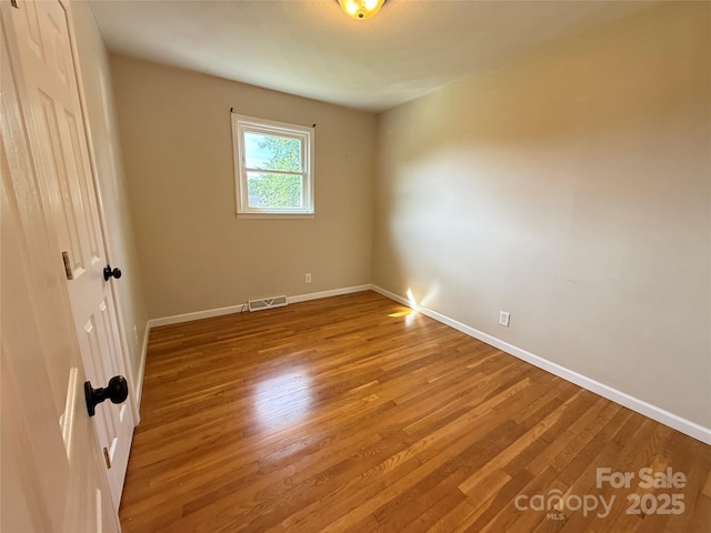 1303 Rambling Acres Cir, Lenoir, NC 28645 - unfurnished room with wood finished floors and baseboards