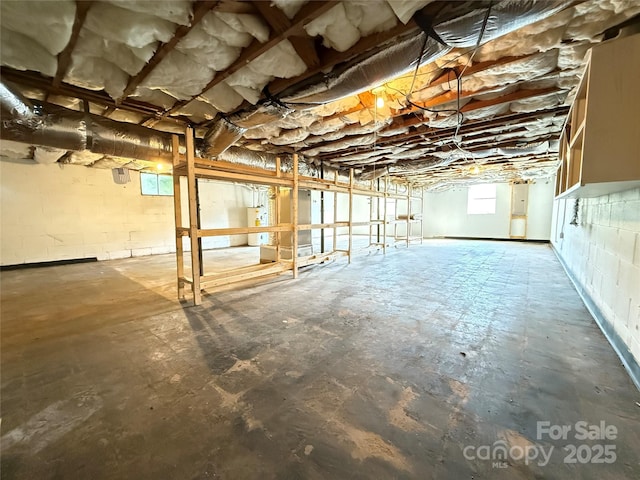 1303 Rambling Acres Cir, Lenoir, NC 28645 - below grade area featuring concrete block wall and water heater