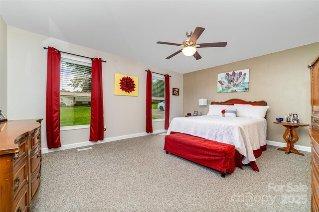 2401 Hoffman St, Gastonia, NC 28054 - carpeted bedroom with a ceiling fan and baseboards