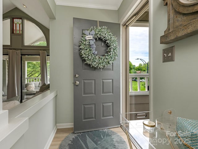 212 W 10th St Unit 3, Charlotte, NC 28202 - entrance foyer with wood finished floors, plenty of natural light, baseboards, and ornamental molding
