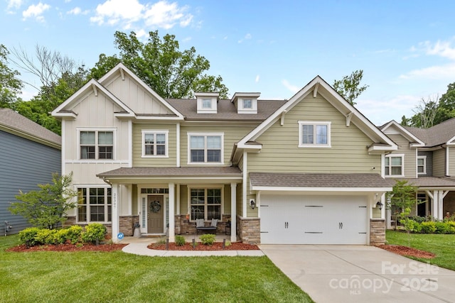 20307 Creek Bend Edge Ct Unit 10, Matthews, NC 28105 - craftsman-style home with roof with shingles, covered porch, driveway, and a front lawn