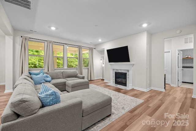20307 Creek Bend Edge Ct Unit 10, Matthews, NC 28105 - living area featuring a fireplace, light wood-style floors, and recessed lighting
