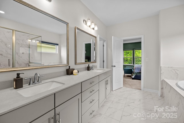 20307 Creek Bend Edge Ct Unit 10, Matthews, NC 28105 - bathroom with marble finish floors, a garden tub, double vanity, a marble finish shower, and connected bathroom