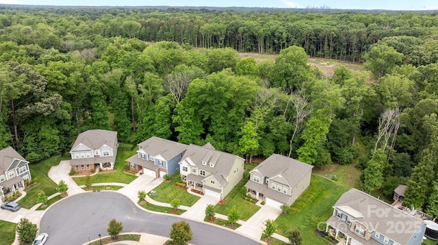 20307 Creek Bend Edge Ct Unit 10, Matthews, NC 28105 - aerial perspective of suburban area with a heavily wooded area