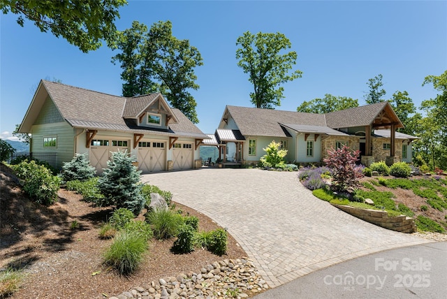 442 Signature Row Blvd, Waynesville, NC 28785 - craftsman-style home with driveway, an attached garage, and stone siding