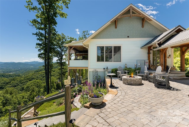 442 Signature Row Blvd, Waynesville, NC 28785 - view of patio / terrace with a fire pit and a mountain view