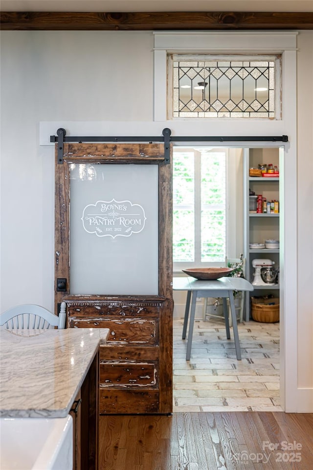 442 Signature Row Blvd, Waynesville, NC 28785 - interior space featuring wood finished floors and a barn door