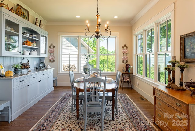442 Signature Row Blvd, Waynesville, NC 28785 - dining space with plenty of natural light, a chandelier, dark wood finished floors, crown molding, and recessed lighting
