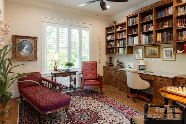 442 Signature Row Blvd, Waynesville, NC 28785 - office space with a ceiling fan, wood finished floors, healthy amount of natural light, built in study area, and crown molding