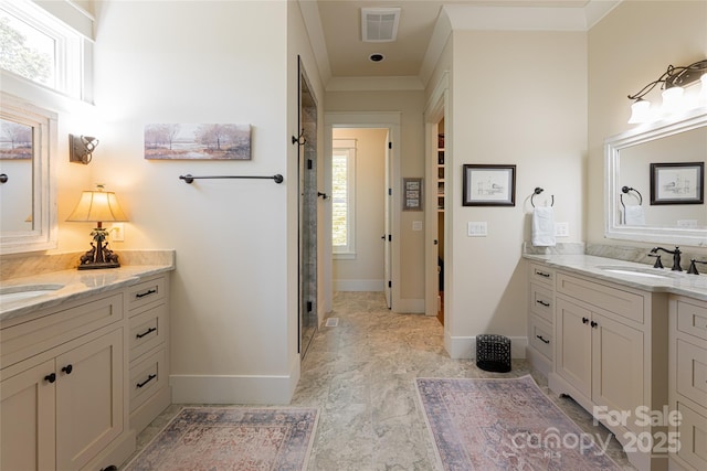 442 Signature Row Blvd, Waynesville, NC 28785 - full bath with two vanities, a stall shower, ornamental molding, and baseboards