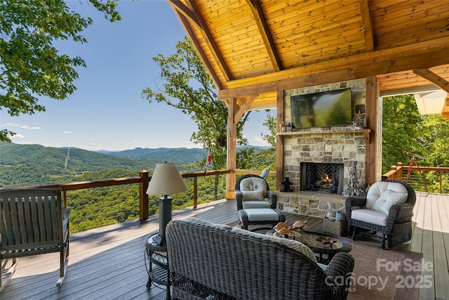 442 Signature Row Blvd, Waynesville, NC 28785 - wooden terrace with an outdoor stone fireplace