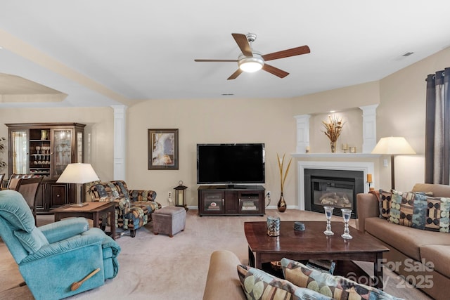 6104 Follow The Trl, Indian Trail, NC 28079 - living area with carpet floors, ornate columns, ceiling fan, and a glass covered fireplace
