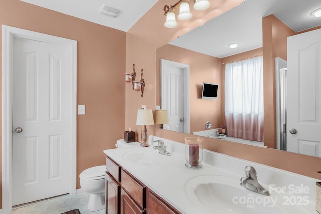 6104 Follow The Trl, Indian Trail, NC 28079 - full bathroom with toilet, double vanity, and tile patterned flooring