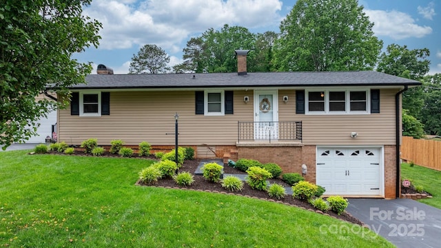 2401 Hillside Dr, Newton, NC 28658 - ranch-style home with a chimney, a garage, driveway, and brick siding