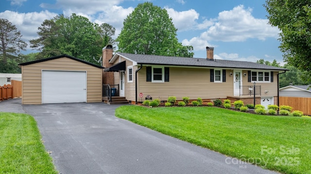 2401 Hillside Dr, Newton, NC 28658 - ranch-style house with a garage, a chimney, an outbuilding, and asphalt driveway