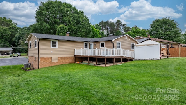 2401 Hillside Dr, Newton, NC 28658 - back of property with central AC unit and a deck