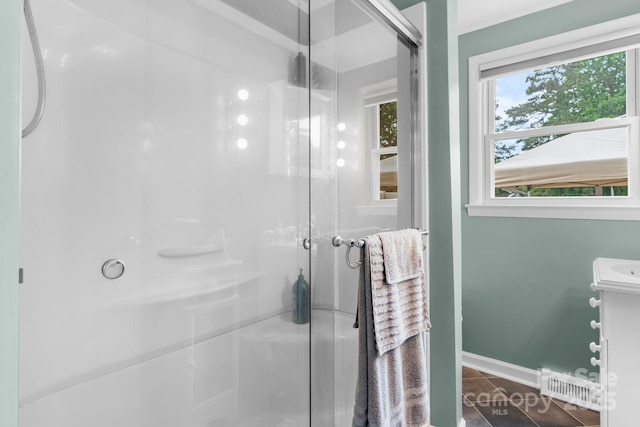 2401 Hillside Dr, Newton, NC 28658 - bathroom featuring a shower stall, tile patterned floors, and baseboards