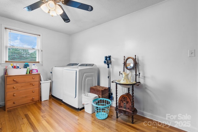 2401 Hillside Dr, Newton, NC 28658 - washroom featuring independent washer and dryer, light wood-type flooring, a ceiling fan, crown molding, and a textured ceiling