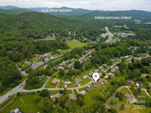 128 Allison Rd, Brevard, NC 28712 - aerial view of a heavily wooded area and mountains